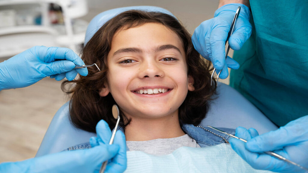 close up boy dentist Discover the History and Invention of Braces in Orthodontics